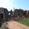 Old damaged buildings near Qutub Minar at Delhi