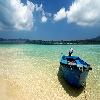Boat in Jolly buoy island for underwater corals view at Andaman