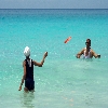 People playing in a sea beach