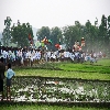 Village people gathering during the procession