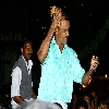 Breaking the coconut with the head during the festival