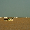 Fishermen entering sea at Vasishta Godavari of Antarvedi in Andhrapradesh