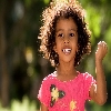 Little girl with rising hands