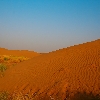 Color of Sand dunes under fading sunlight