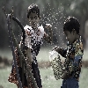 kids playing with tap water dirty box candid moments