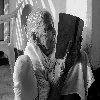 Old aged woman reading a book