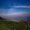 Blue sky and green valley near Kedar Kantha trekking camp