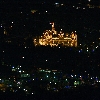 illuminated main palace of Mysore as seen from Chamundi hill