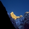 Golden color at morning of Neelkanth peak behind Nara Hill at Badrinath Dham