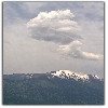Clouds and snow covered peak view at Naggar, Manali