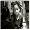 Girl looking at the photographer with a strange look