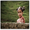 Girl kid looking curiously