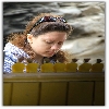 foreign lady purchasing an item 