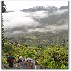 Himalayan trekkers with plastic covers during rain