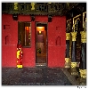 Old woman standing inside an old palace