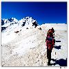 Trekkers Walking on Ice in Himalaya Sarpass trekking