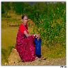 Tribal lady waiting by the road side at Paderu
