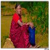 Lady waiting for vehicle near Araku - Paderu