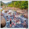 Taking bath at flowing stream at Chaparai