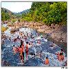 Enjoying the bath at flowing water stream at Chaparai 