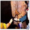 Water drops falling from stalactites inside cave of Gupteswar