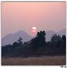 Red sun before sunset on river Godavari