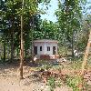 Pre-fabricated cottages at a distance in Vanvihari resort