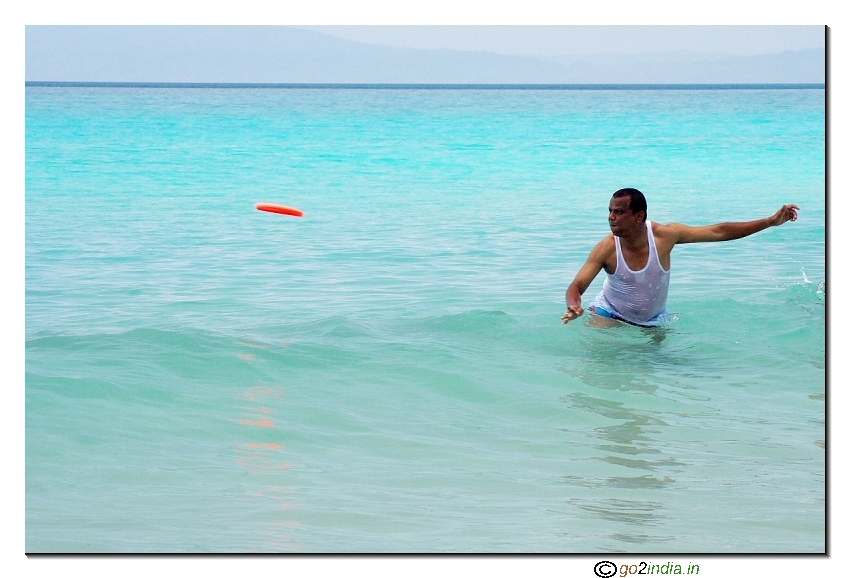 People playing in a sea beach