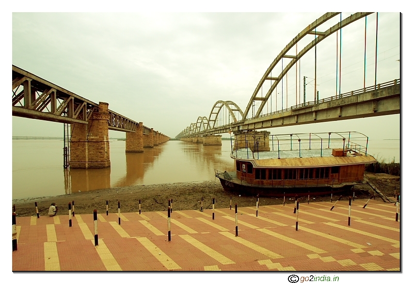 Boat between old and new bridge on river Godavari at Rajahmundry Andhrapradesh