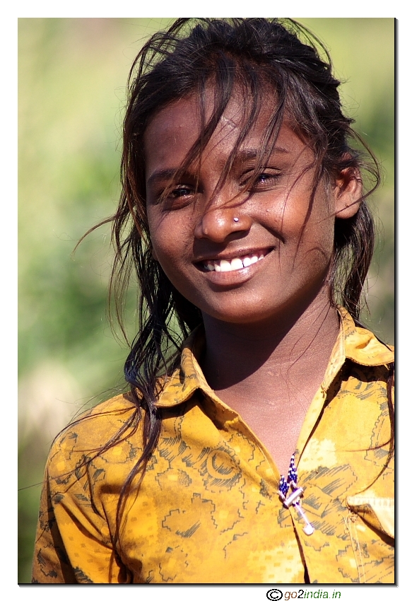 Portrait of a village girl smiling shots from Tamron 70-300 on Canon 30D