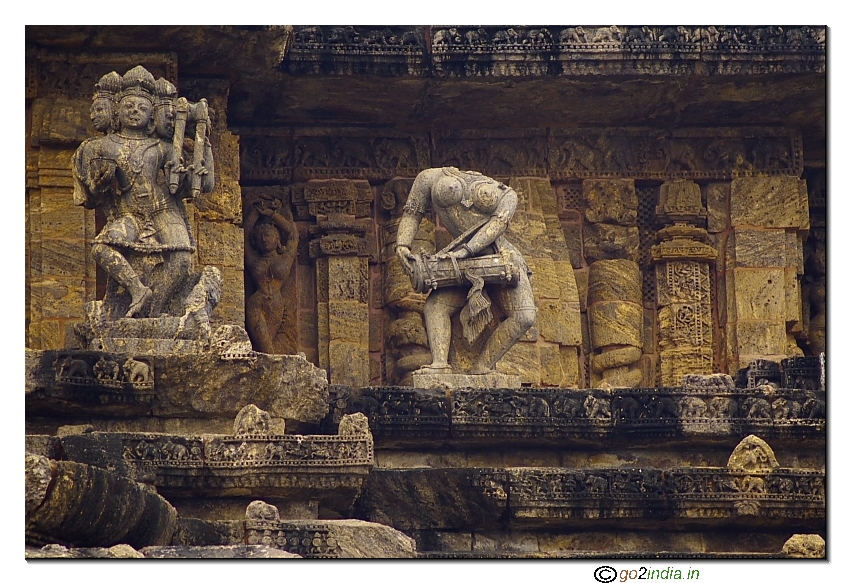 Sun temple Konark statues on top of the temple close up view