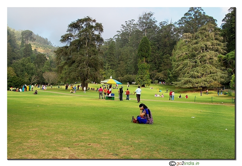 Girl reading and spending time in Botanical garden Ooty