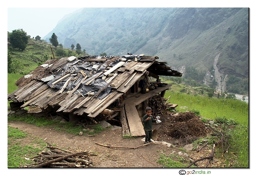 Kid in front of the house at Garhwal Uttarakhanda