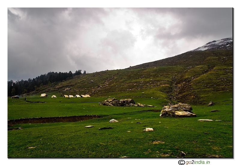Kedarkantha camps at a beautiful  green meadow