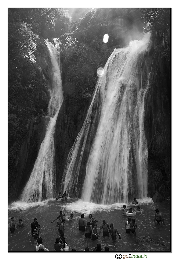taking bath below waterfall at Mussoori
