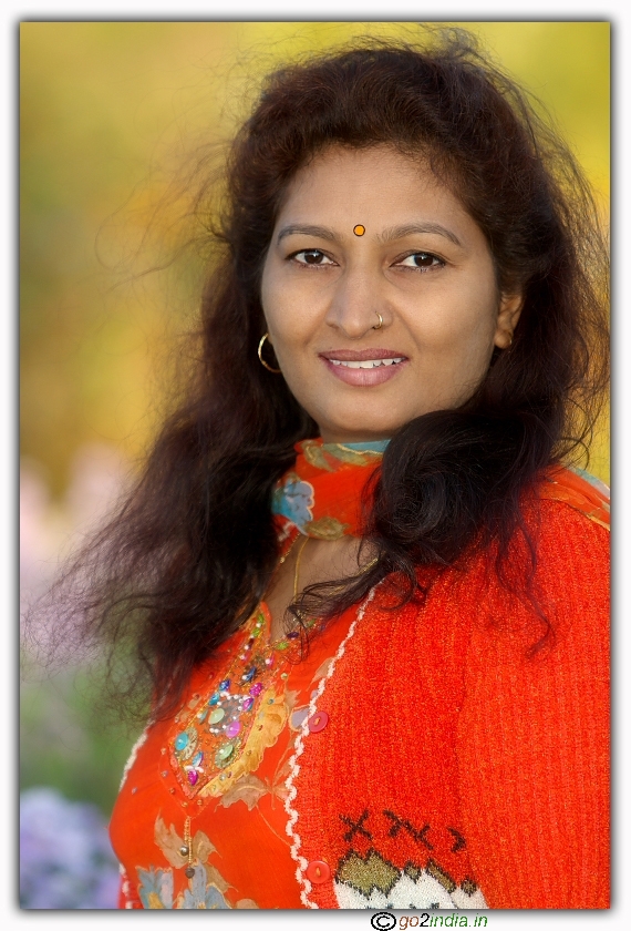 Lady in orange dress portrait with Canon 70-200 f2.8