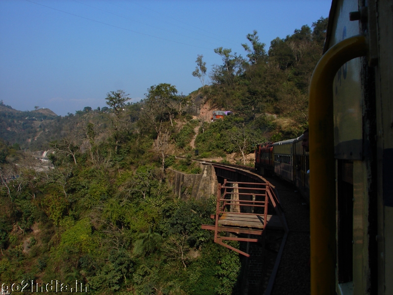 Curved bridge and train