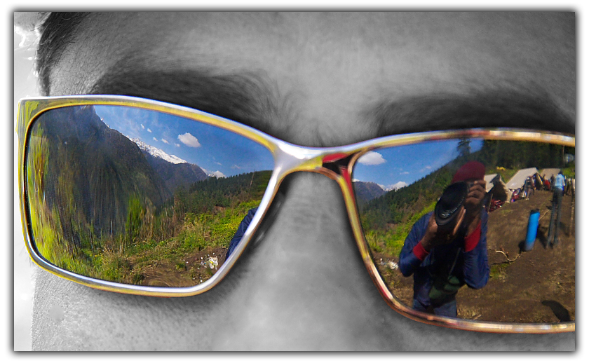 Guna pani camp and Himalayan range reflection through gogles 