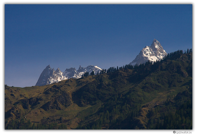 Om peak hill ranges during evening photo taken during evening