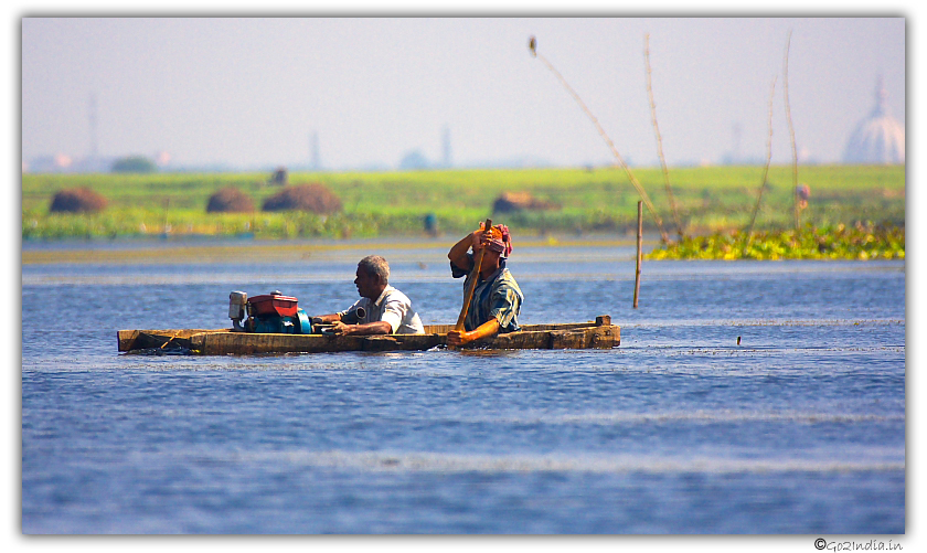People watching birds at Oxbow lake Purbasthali