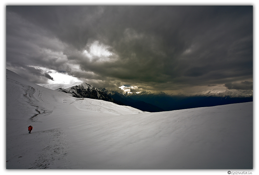Guide walking at Himalayas during Saur lake crossing