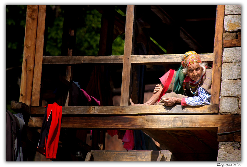 Old woman peeping out
