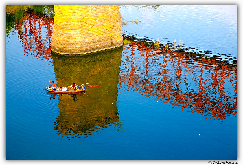 Boat below old bridge on Godavari river at Rajahmundry