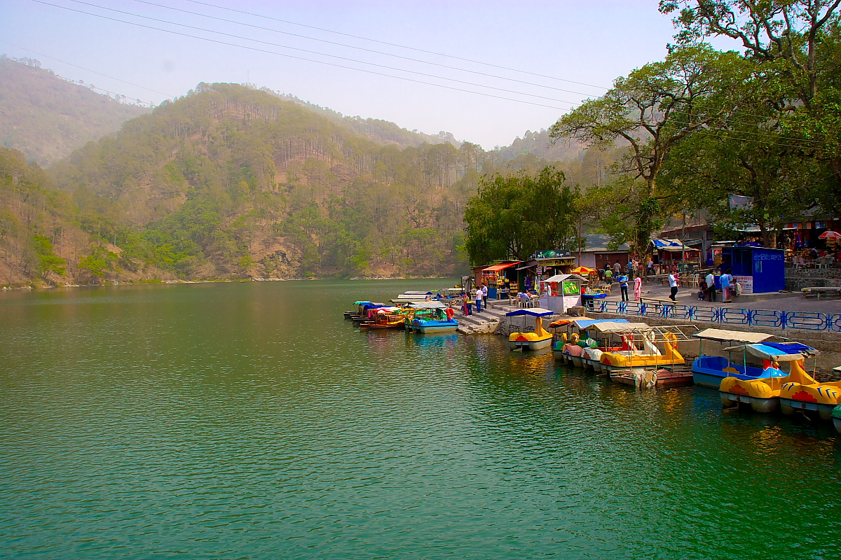 view of the boats parked on the bank of the lake