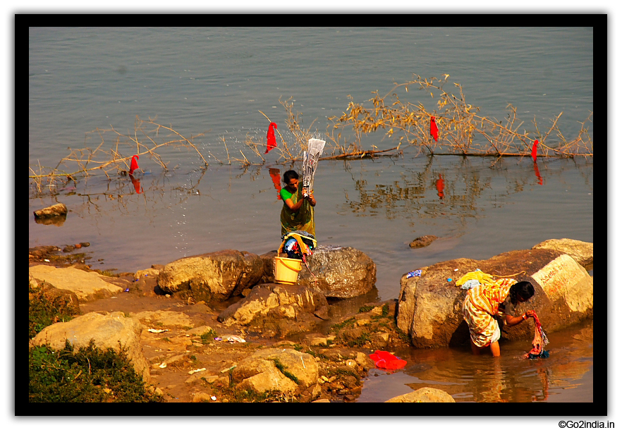Villagers at river 