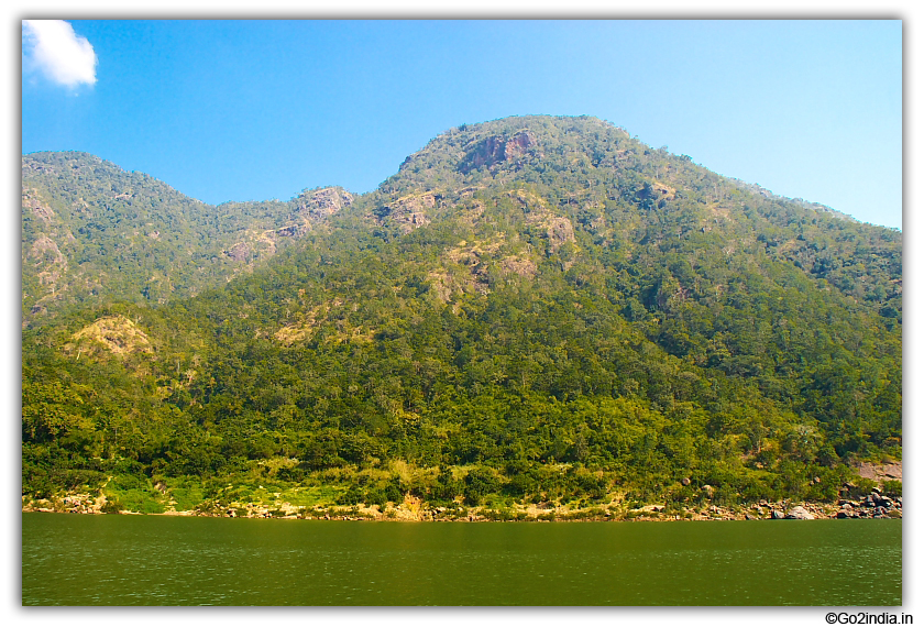 small and big hills by the side of river 