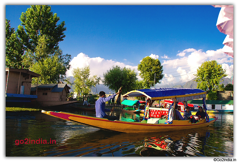 Tourist enjoying Shikara in Dal Lake 