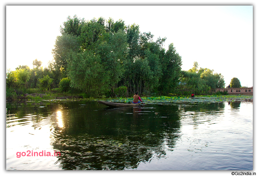 Locals also use small boats at Dal Lake