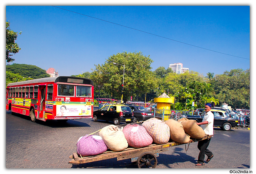 A porter with cart at South Mumbai