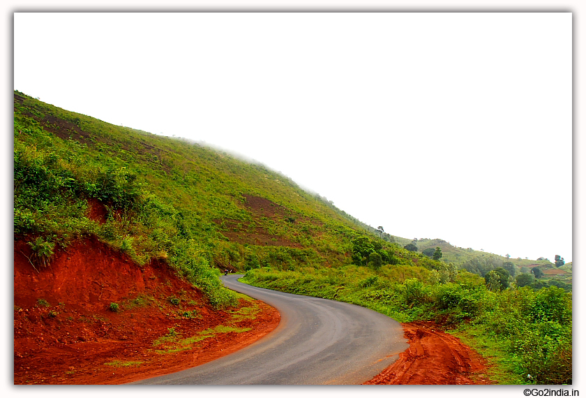 Curved road during rainy season 